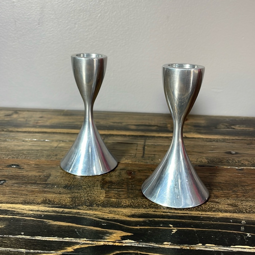Umbra somewhat heavy pair of metal candle holders.  Super cute!